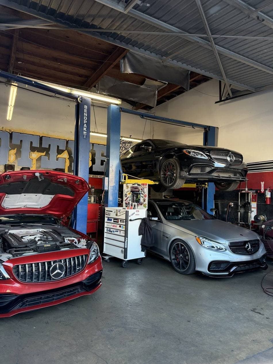 Mercedes-AMG vehicles being serviced on the lifts at A1 Automotive in Cypress, California
